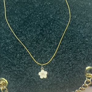 Elegant Gold Necklace with Flower Pendant